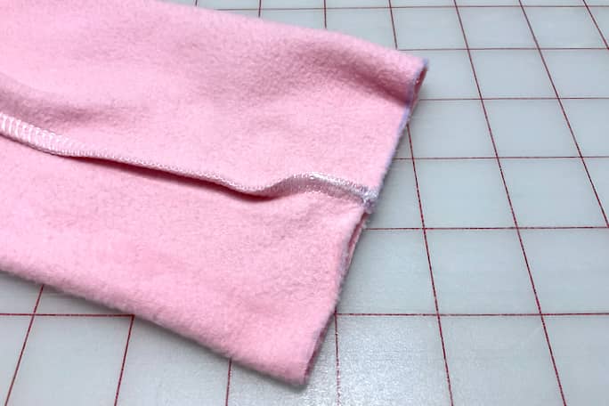 Tidy Sleeve Seam with Cleaned Serger Tail