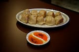 #7 Grilled Pork & Vegetable Dumplings – $8.99