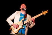 Alain Pérez Singing & Playing Bass